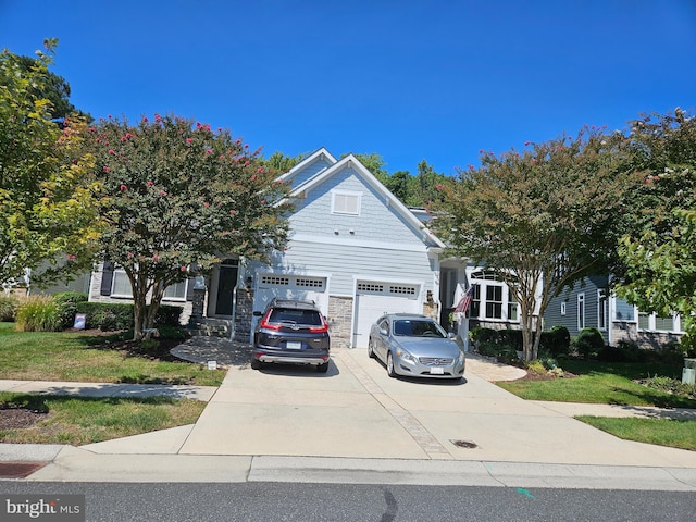 view of front of property featuring a garage