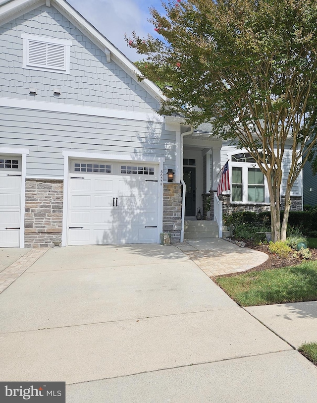 view of front of home with a garage