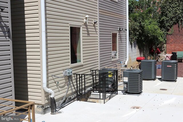 view of patio with cooling unit