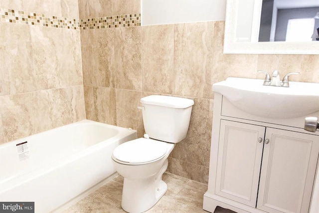 bathroom with vanity, tile walls, toilet, and tile patterned flooring