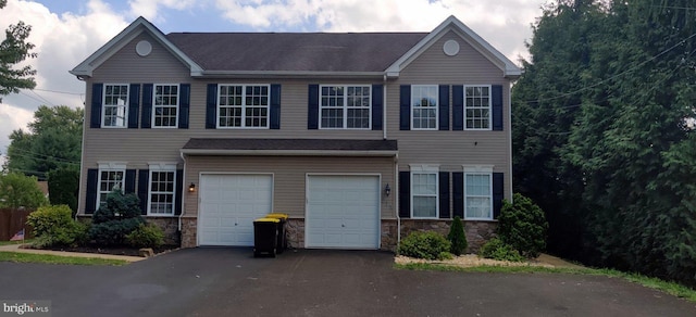 view of front of property featuring a garage