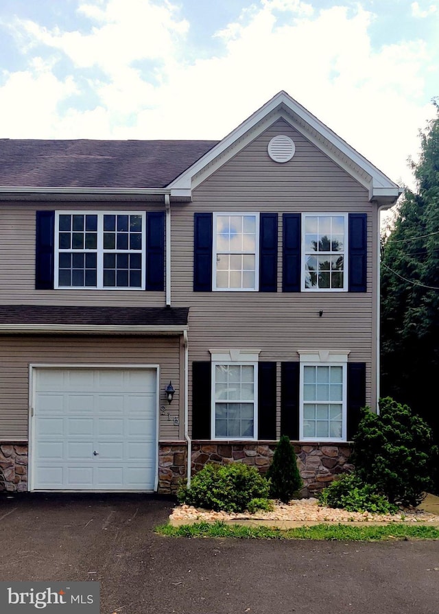 view of front of home featuring a garage