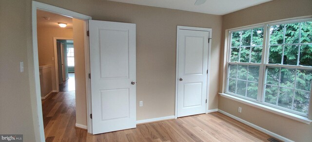 unfurnished bedroom featuring light hardwood / wood-style floors