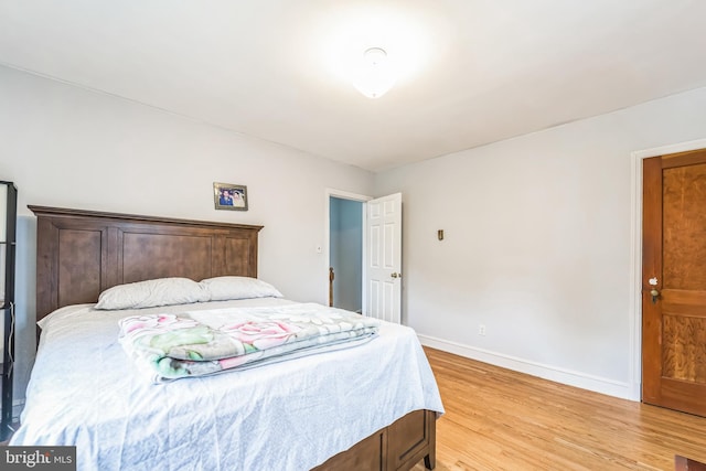 bedroom with light hardwood / wood-style flooring