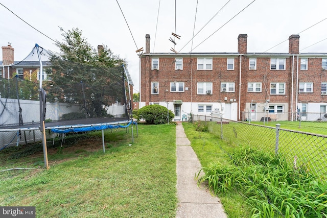 view of yard with a trampoline