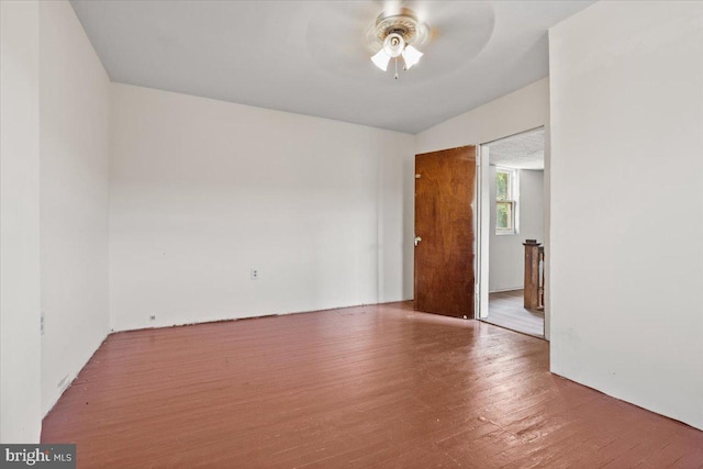 empty room featuring hardwood / wood-style floors and ceiling fan