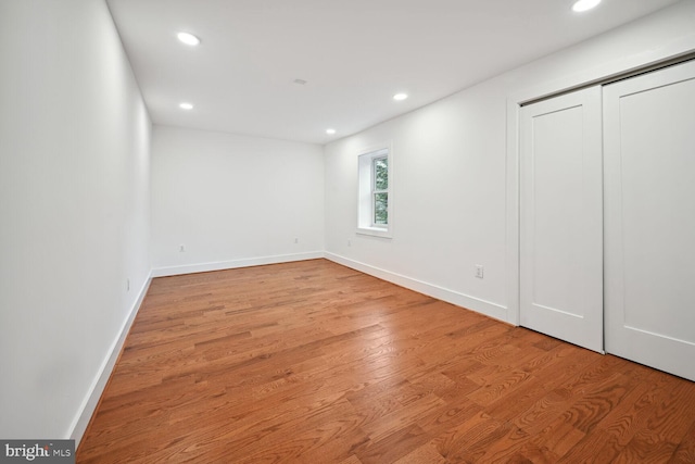 unfurnished bedroom with light hardwood / wood-style floors