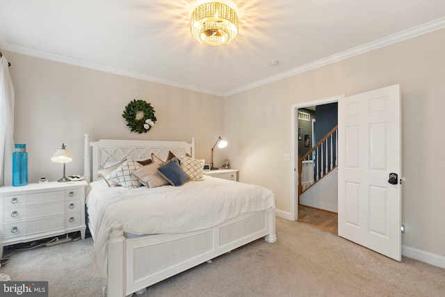 bedroom featuring light colored carpet and crown molding