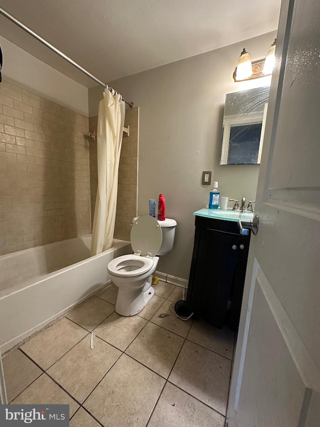 full bathroom with shower / bath combo with shower curtain, tile patterned floors, vanity, and toilet