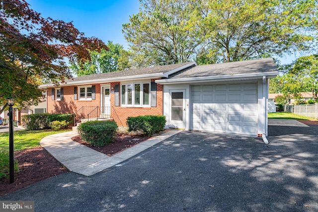 single story home with a garage