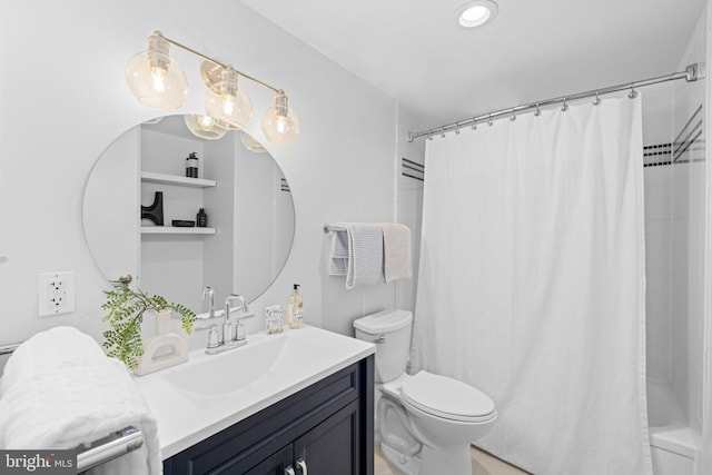 full bathroom with vanity, toilet, and shower / tub combo with curtain