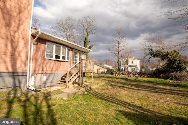 view of yard with a deck