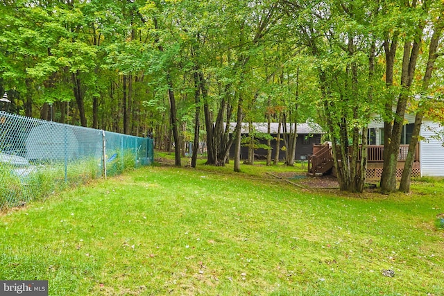 view of yard featuring a deck