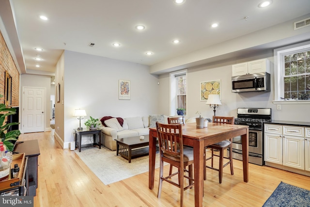 dining area featuring light hardwood / wood-style flooring