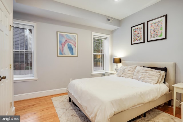 bedroom featuring light hardwood / wood-style flooring