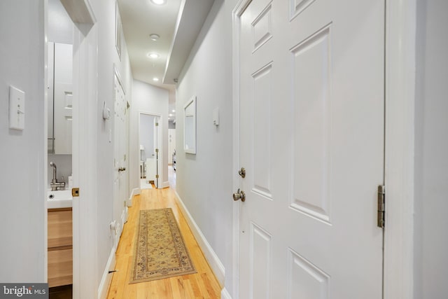 hallway featuring light wood-type flooring