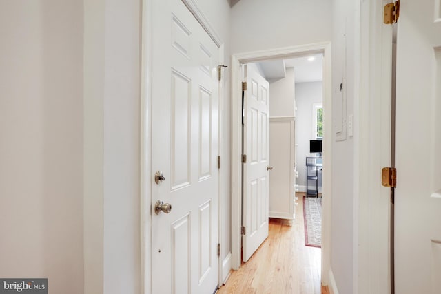 hallway featuring light wood-type flooring