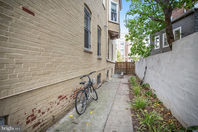 view of property exterior with a patio