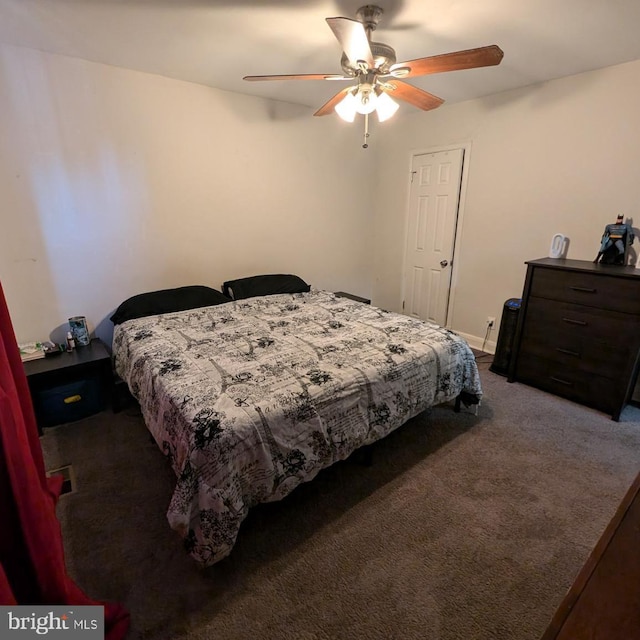 carpeted bedroom featuring ceiling fan