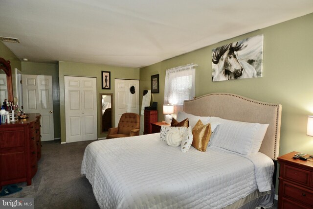 full bathroom with toilet, hardwood / wood-style flooring, bath / shower combo with glass door, and vanity