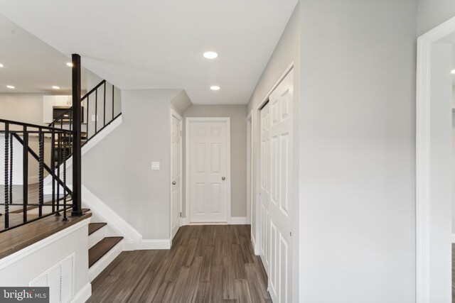 interior space with dark wood-type flooring