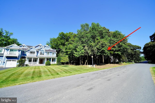 exterior space with a front yard