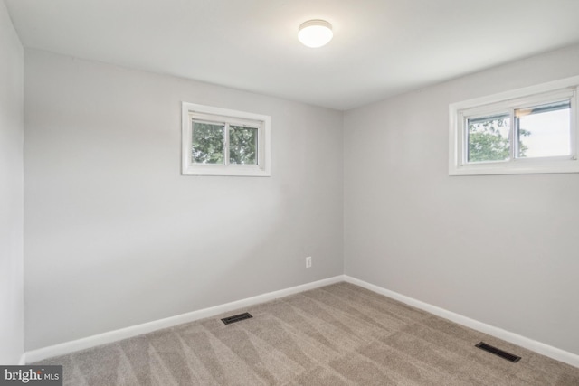 view of carpeted spare room