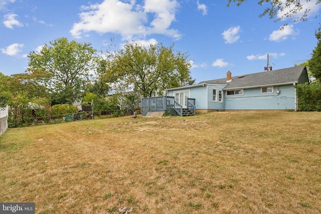 view of yard featuring a deck