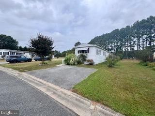 view of home's exterior featuring a lawn