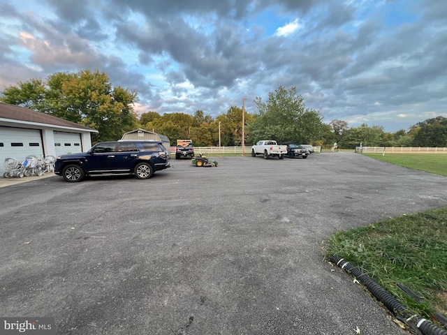 view of parking with a garage