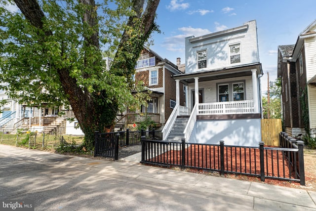 view of front of home featuring covered porch