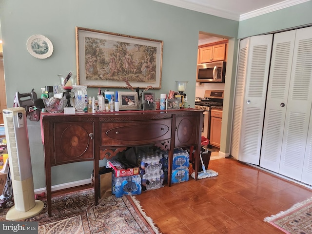 living area featuring crown molding