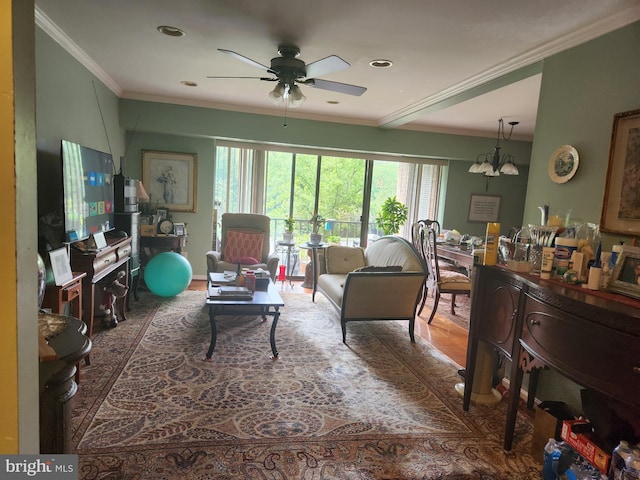 living room with ceiling fan, crown molding, and wood-type flooring