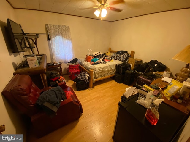 bedroom featuring ceiling fan and light hardwood / wood-style flooring