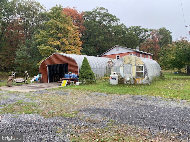 exterior space with a carport