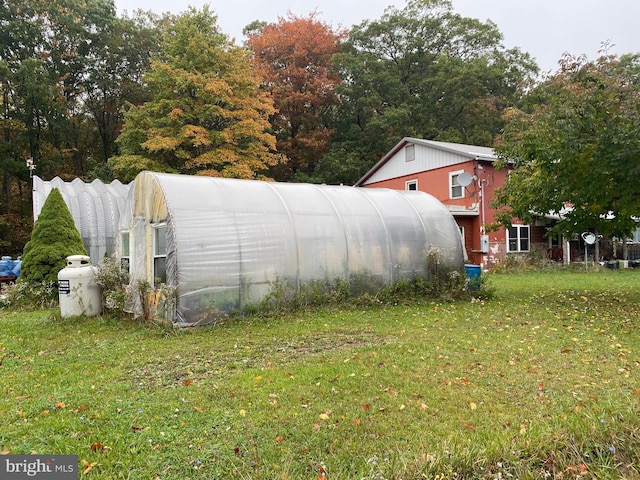 exterior space with an outbuilding