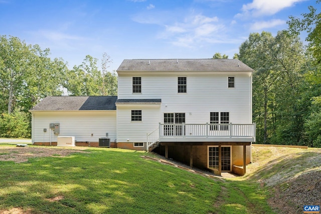 back of house with a lawn, central AC unit, and a deck