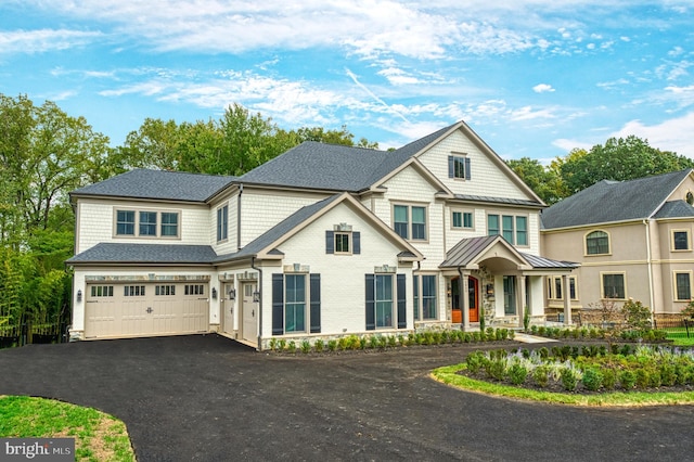 craftsman inspired home with a garage