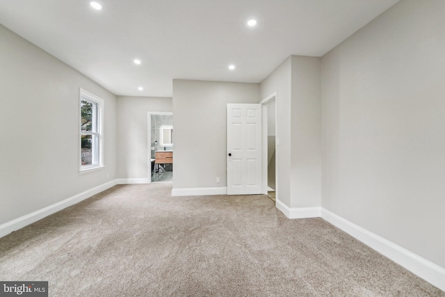 spare room featuring carpet flooring