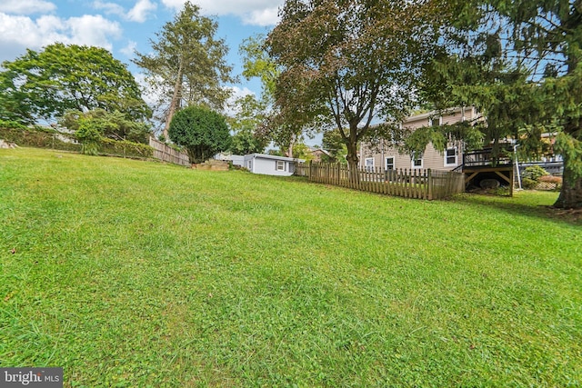 view of yard featuring a deck