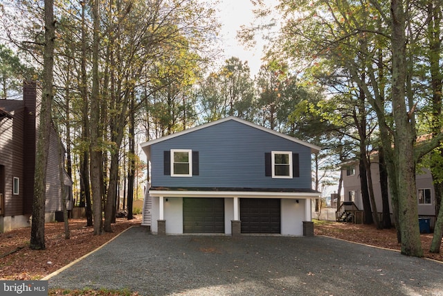 view of side of property featuring a garage