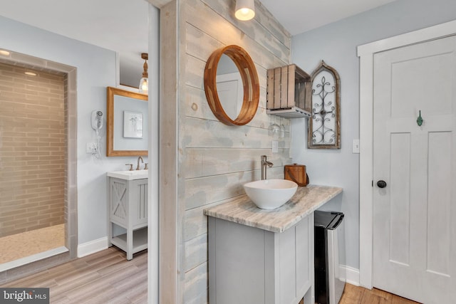 bathroom with wood-type flooring and vanity