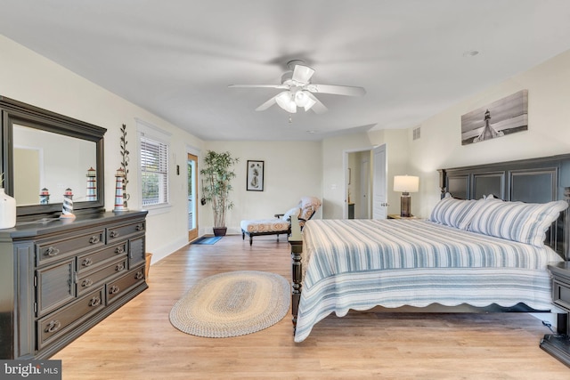 bedroom with light wood-type flooring and ceiling fan