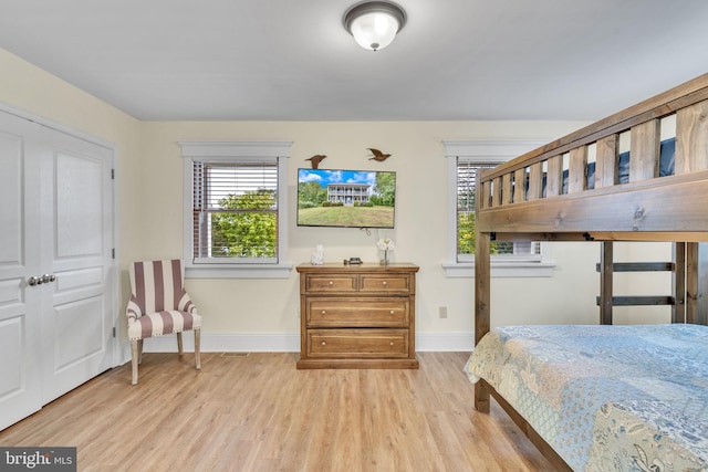 bedroom with light hardwood / wood-style flooring