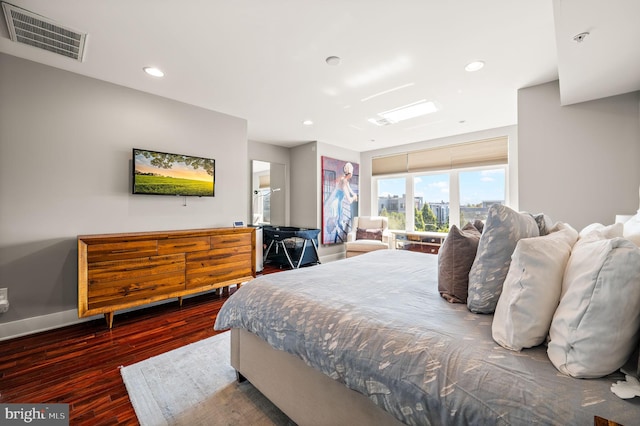 bedroom featuring dark wood-type flooring