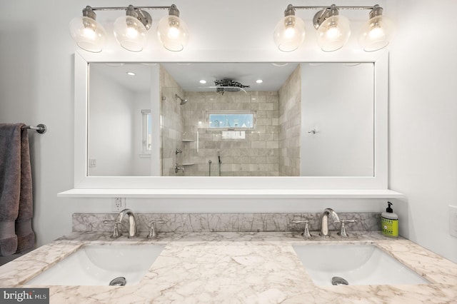 bathroom with vanity and an enclosed shower