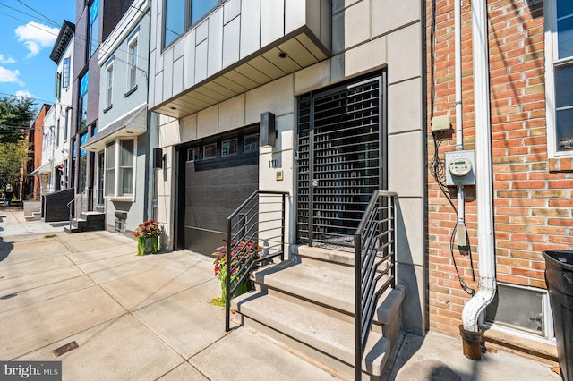 property entrance featuring a garage