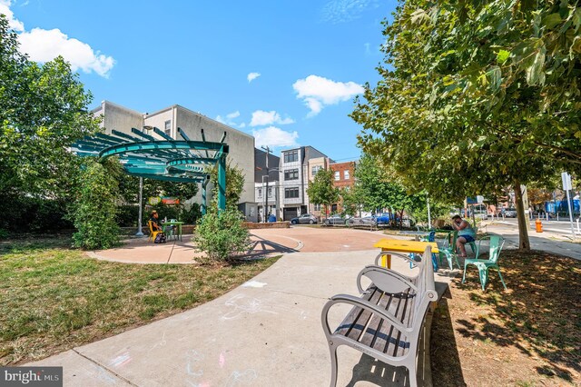 surrounding community with a pergola