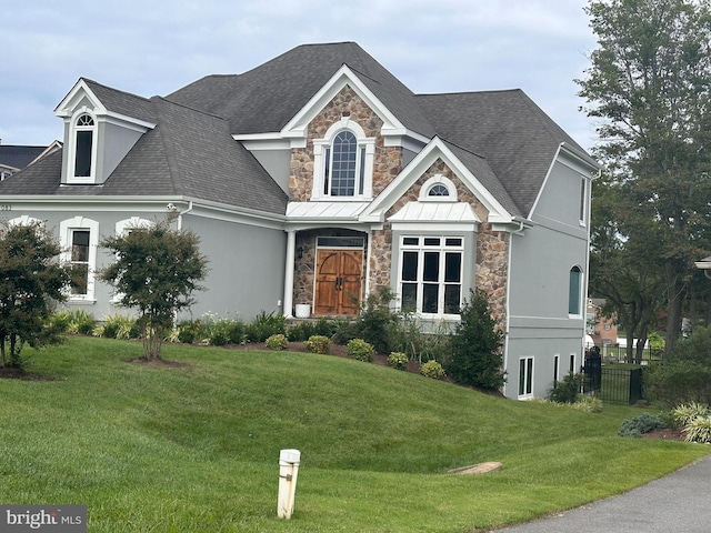 view of front of home featuring a front yard