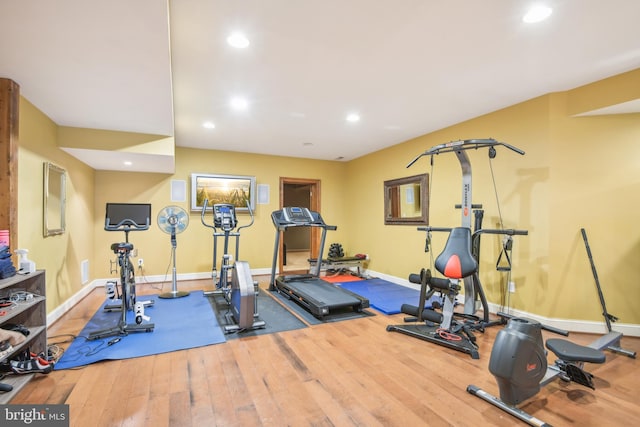 exercise area with hardwood / wood-style flooring